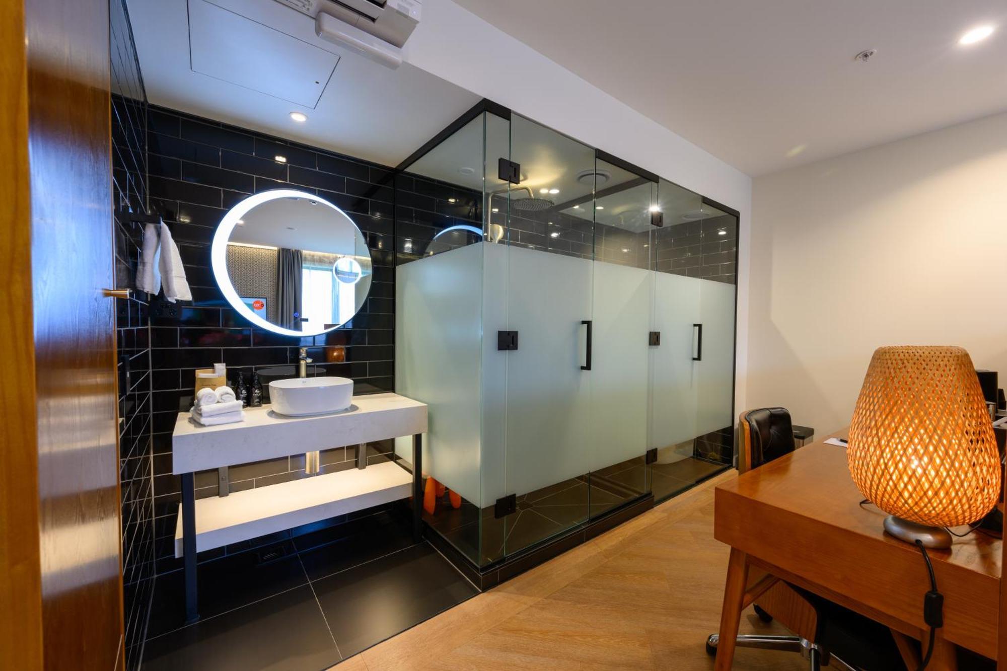 Ohtel Auckland Hotel ห้อง รูปภาพ A bathroom in a hotel